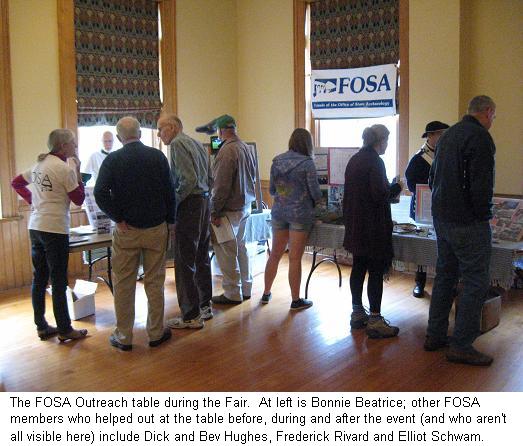 The FOSA Outreach table during the Fair. At left is Bonnie Beatrice;
                                          other FOSA members who helped out at the table before, during and 
                                          after the event (and who aren't all visible here) include Dik and Bev
                                          Hughes Frederick Rivard and Elliot Schwam.