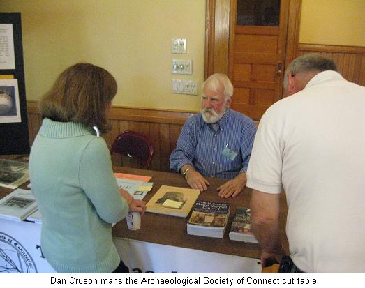Dan Cruson mans the Archaeological Society of Connecticut table.