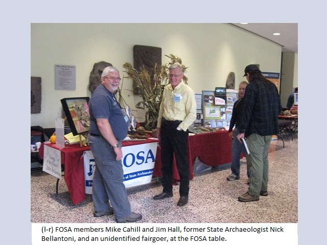 (left ro right) FOSA members Mike Cahill and Jim Hall, former CT State
                                           Archaeologist Nick Bellantoni, and an unidentified fairgoes, at the
                                           FOSA table.