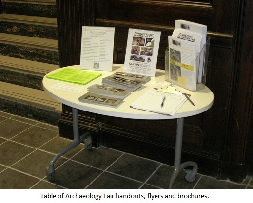 Table of Archaeology Fair handouts, flyers and brochures.