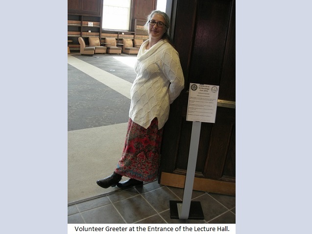 Volunteer greeter at the Entrance of the Lecture Hall.