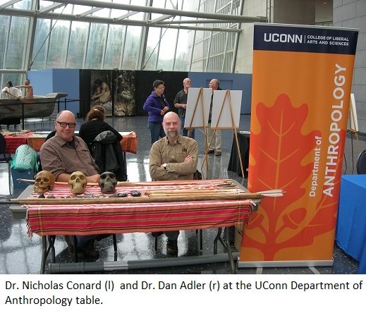 Dr. Nicholas Conard (l) and Dr. Dan Adler (r) at the UConn Department 
                                          of Anthropology table.