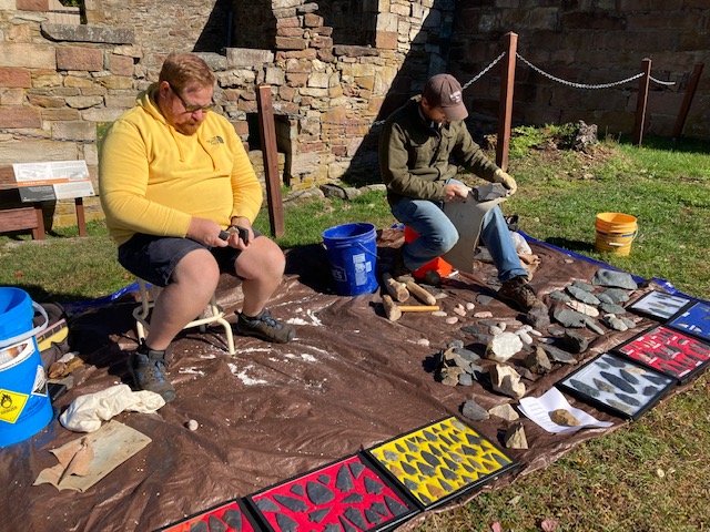October 8, 2022. Participants engaged in flint-knapping.