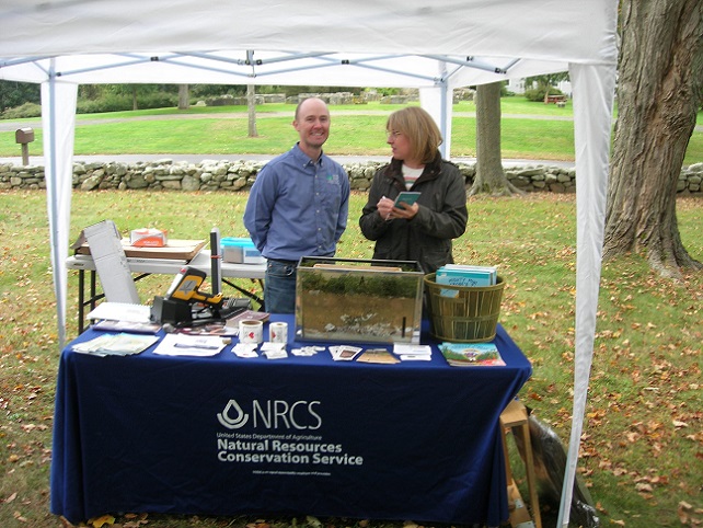 October 14, 2023. Jacob Isleib and Krista Dotzel at the US 
                                       Department of Agriculture's Natural Resources Conservation Service table.
